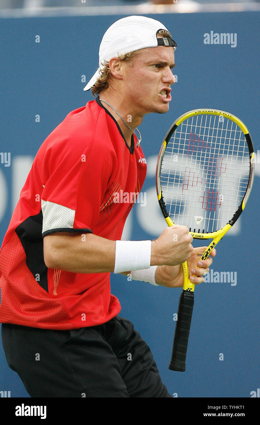 Lleyton Hewitt reacts when breaking serve in the first set of his
