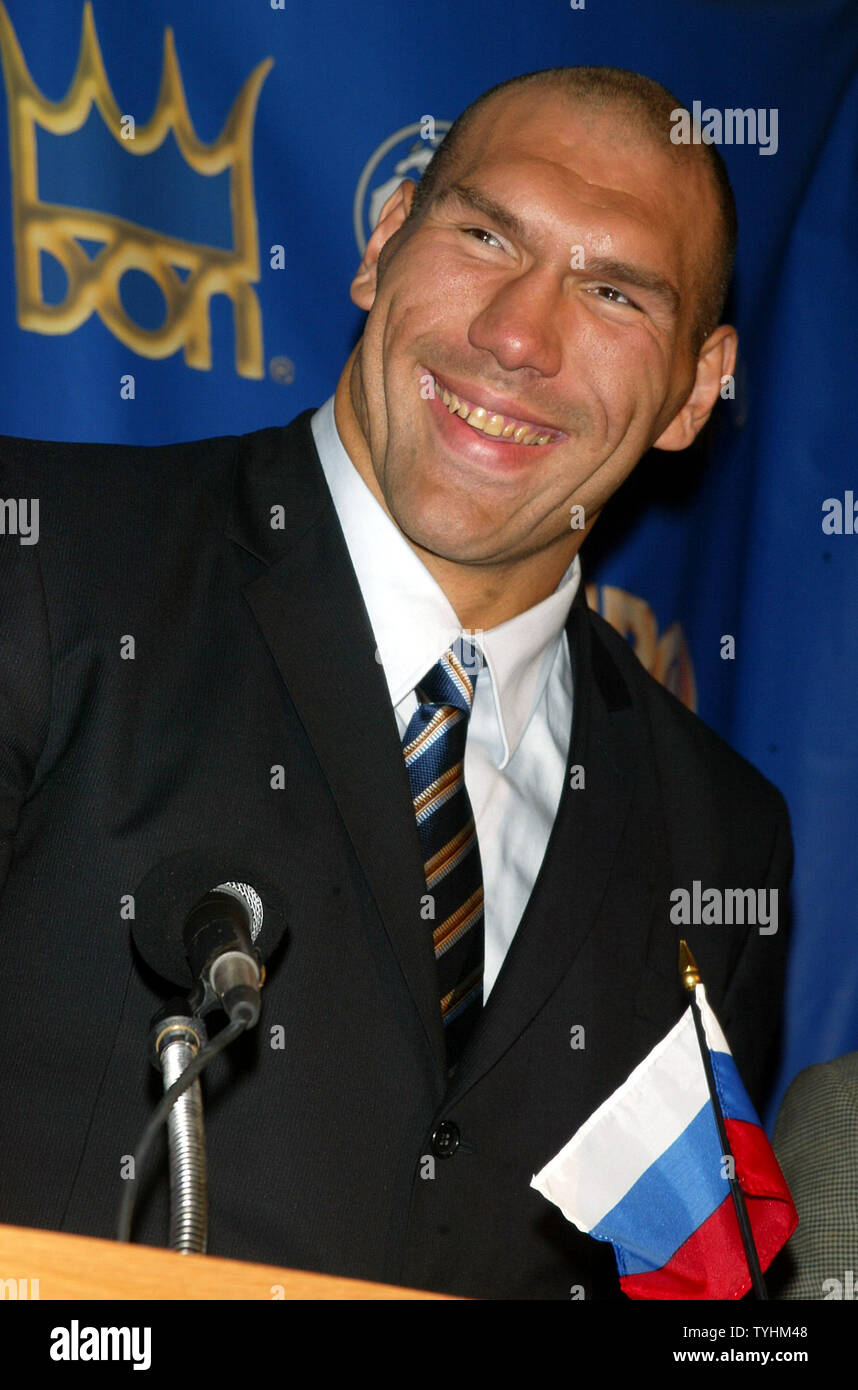 Nikolai 'Russian Giant' Valuev talks to the media during a press conference to announce his upcoming boxing match with Monte 'Two Gunz' Barrett  (to be held in Chicago on October 7, 2006) at the Firebird Russian Restaurant in New York on August 30, 2006.  (UPI Photo/Laura Cavanaugh) Stock Photo