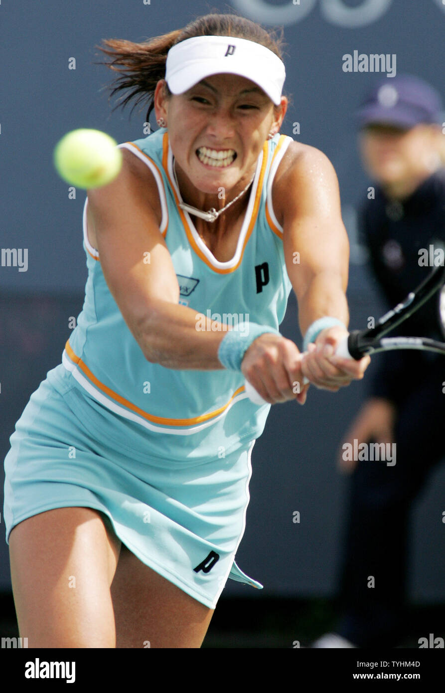 Ai Sugiyama of Japan returns the ball to Tathiana Garbin of Italy in the second set of play at the US Open held at the USTA Billie Jean King National Tennis Center on August 31, 2006 in New York. (UPI Photo/Monika Graff) Stock Photo