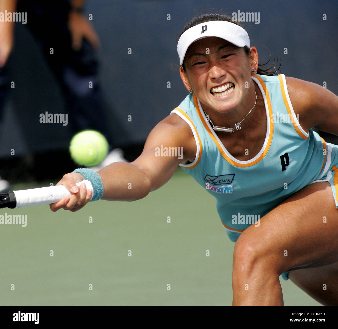 Ai Sugiyama of Japan returns the ball to Tathiana Garbin of Italy in the second set of play at the US Open held at the USTA Billie Jean King National Tennis Center on August 31, 2006 in New York. (UPI Photo/Monika Graff) Stock Photo