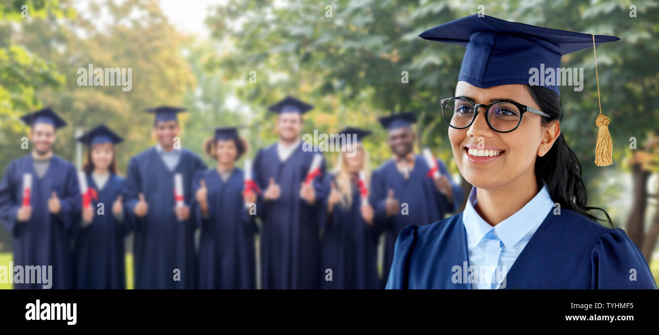 happy female graduate student in mortarboard Stock Photo - Alamy