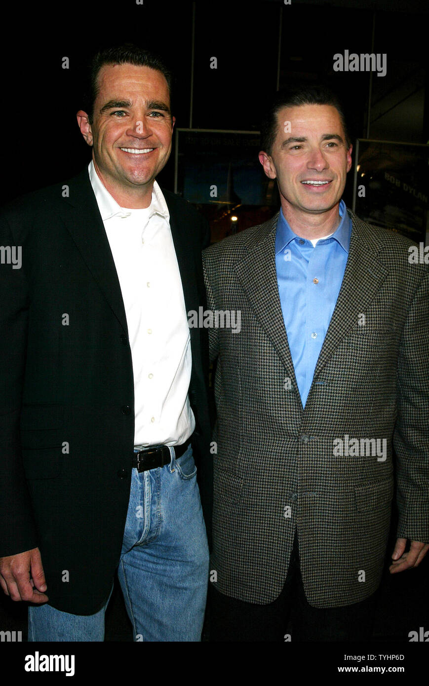 Former New Jersey Governor Jim McGreevey with partner Mark O'Donnell (left) signs copies of his new book 'The Confession' at Barnes & Noble in New York on September 22, 2006.  (UPI Photo/Laura Cavanaugh) Stock Photo