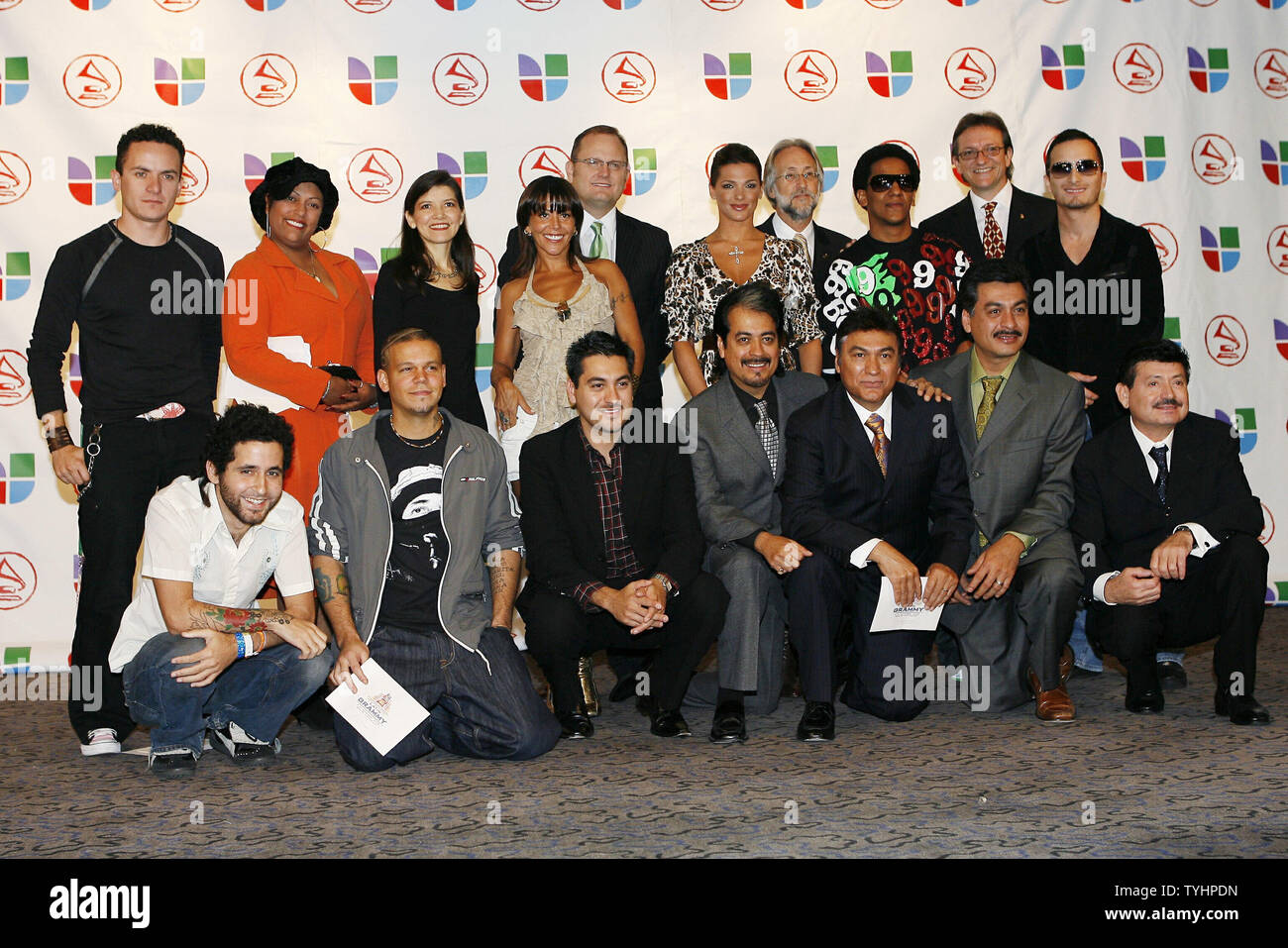 President of the Latin Recording Academy, Gabriel Abaroa, Barbara Bermudo, Obie Bermudez, Tego Calderon, Calle 13, Willie Colon, Fonseca, Alejandra Guzman, India, and Los Tigres Del Norte get together for a picture during the 7th annual Latin Grammy Awards nominee press conference at Madison Square Garden in New York City on September 26, 2006.    (UPI Photo/John Angelillo) Stock Photo