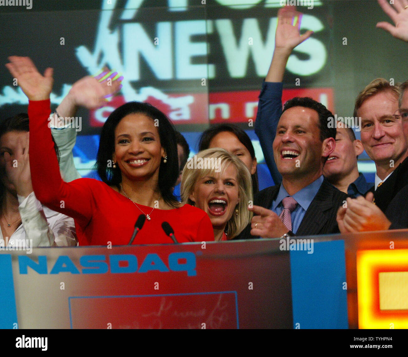 Fox News Channel's Fox & Friends (left to right) Lauren Green, Gretchen Carlson, Brian Kilmeade and Steve Doocy celebrate Fox News Channel's 10th Anniversary by ringing the closing bell at the NASDAQ  in New York on October 4, 2006.  (UPI Photo/Laura Cavanaugh) Stock Photo