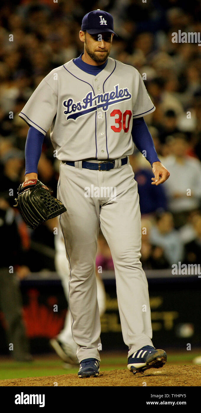 Mark Henderson, relief pitcher for the Angeles Dodgers, reacts after loading the bases with New York Mets in the seventh inning of game two of the National League Division Series at Shea Stadium on October 5, 2006 in New York. (UPI Photo/Monika Graff) Stock Photo