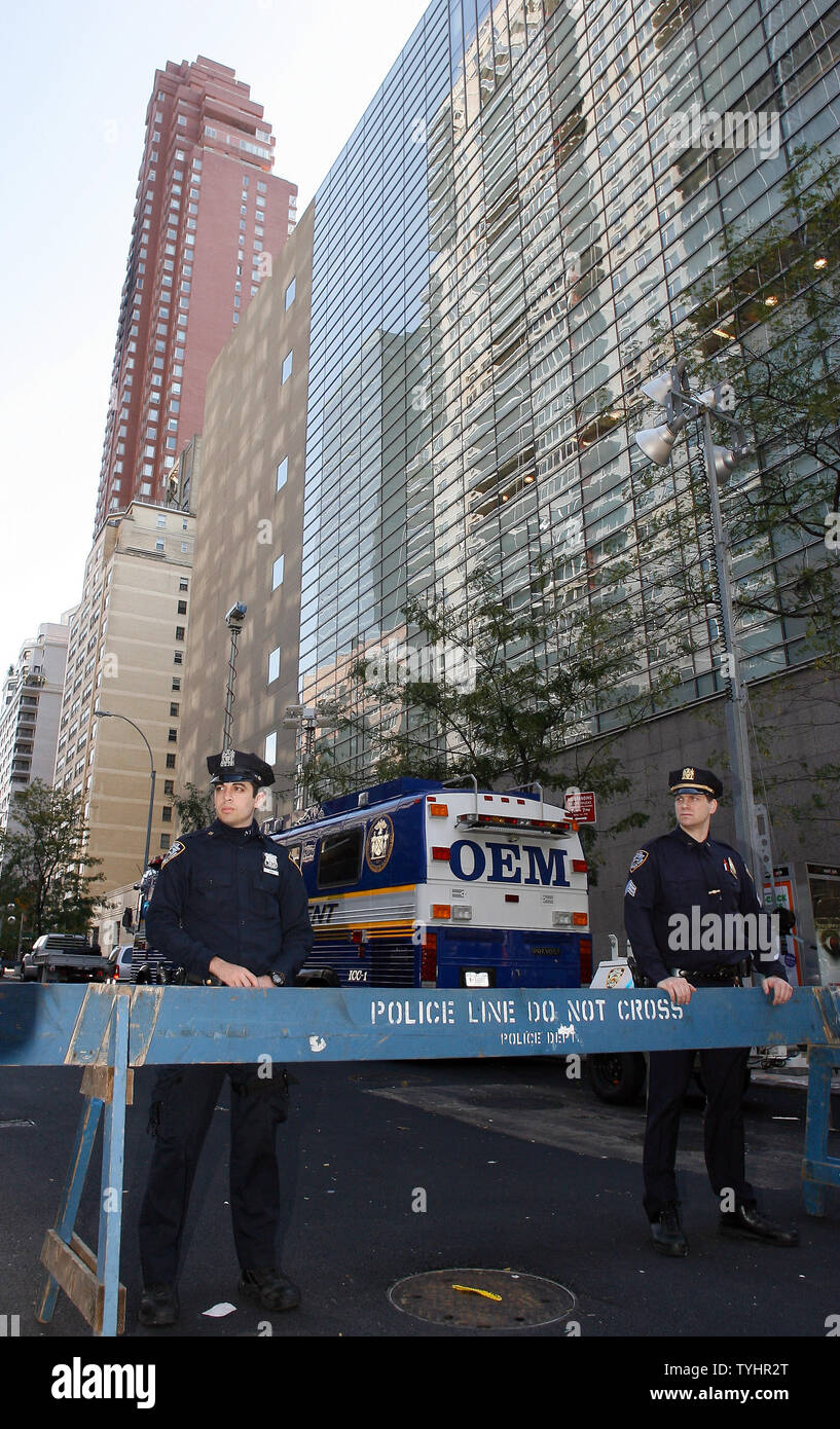 Police secure the area around the plane crash site of New York Yankees