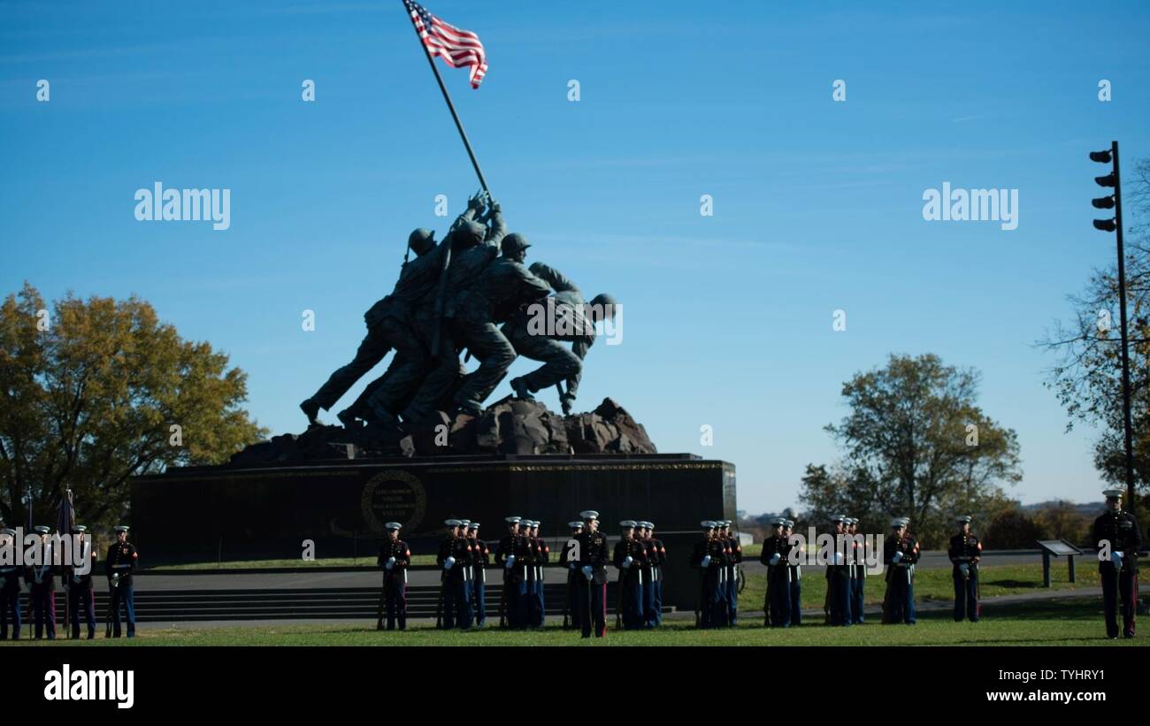 Marines from Marines Barracks Washington form up during a reunion at the Marine Corps War Memorial in Arlington, Va., Nov. 10, 2016. The Marines present a ceremonial wreath to honor the sacrifices of service members in defense of the United States. Stock Photo
