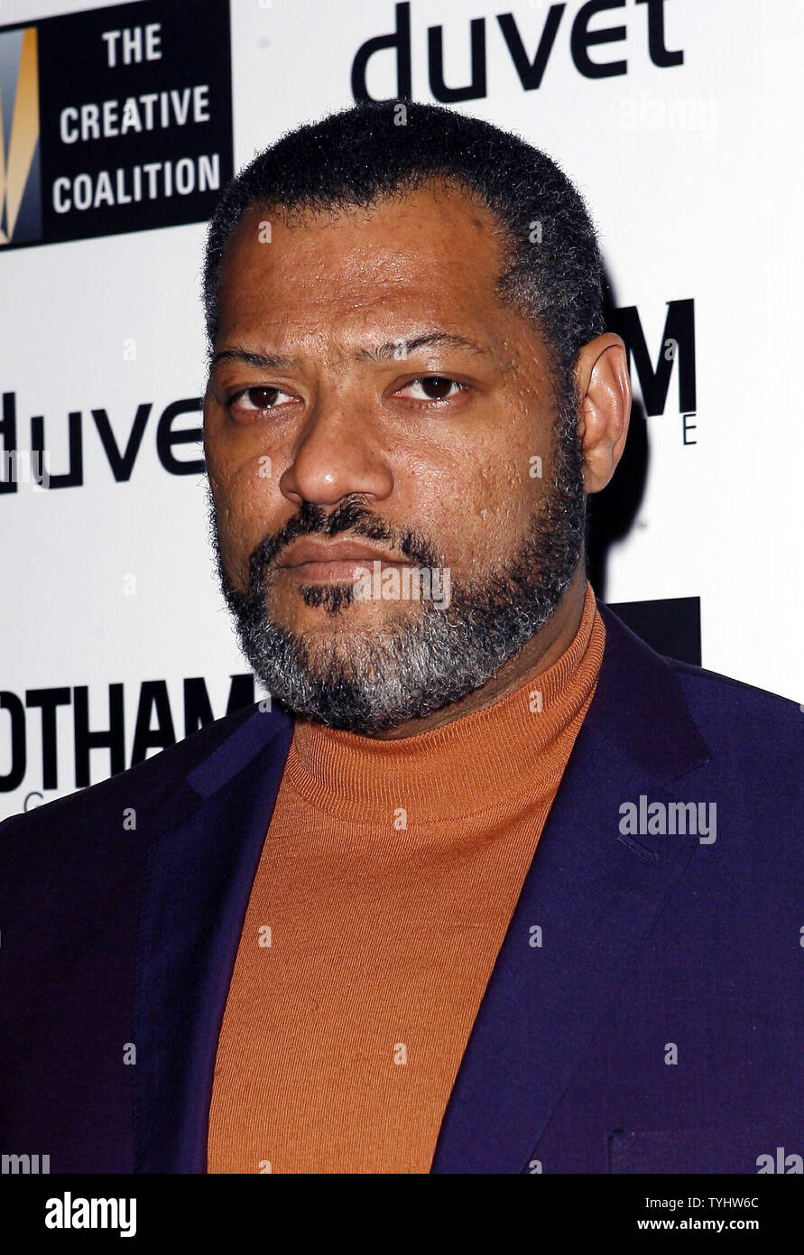 Laurence Fishburne arrives on the red carpet at the Creative Coalition ...