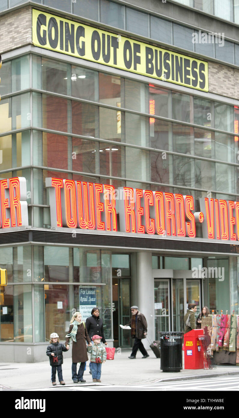 People pass by Tower Records on the 