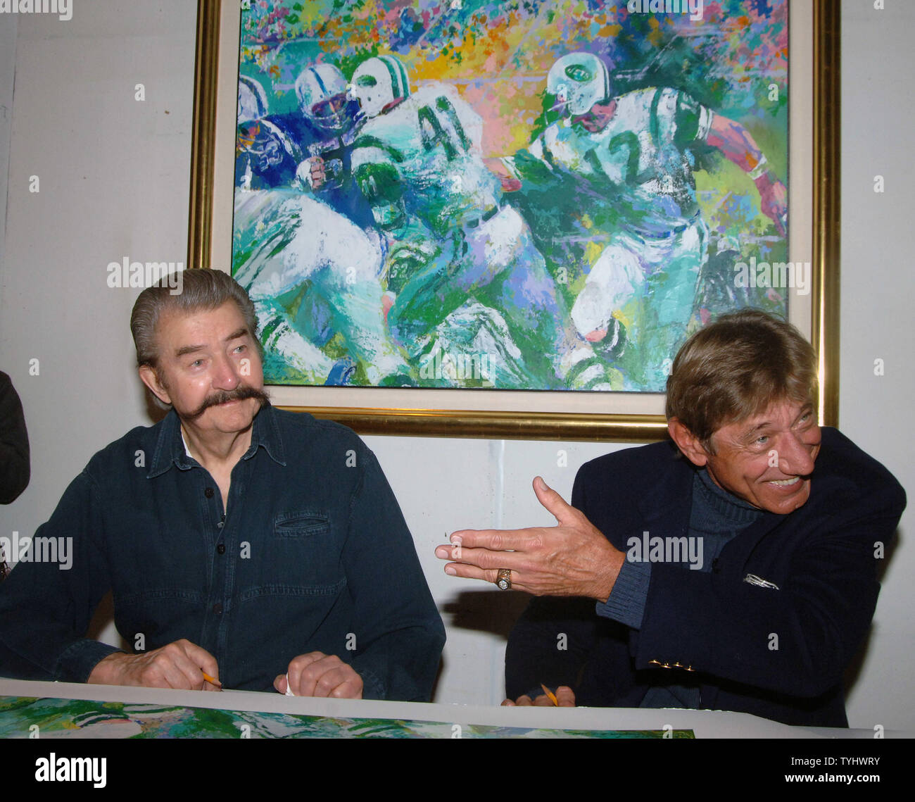 Artist Leroy Neiman and New York Jets former QB Joe Namath (right)  check and sign each of the 350 limited edition  serigraphs on January 18, 2007 depicting Namath's 1969 SuperBowl III win. The New York Jets beat the Baltimore Colts 16-7.  The serigraph will retail for $4200.     (UPI Photo/Ezio Petersen) Stock Photo