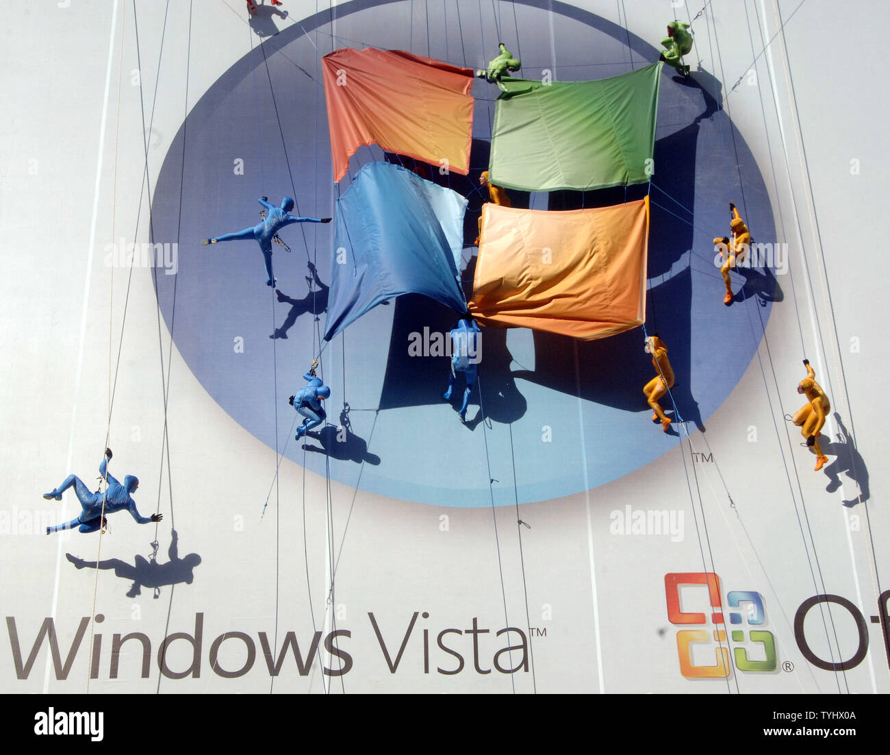 Aerial dancers perform on the side of the Terminal building in New York City to announce the launch of Microsoft Windows Vista and Windows office icon on January 29, 2007.  (UPI Photo/Ezio Petersen) Stock Photo