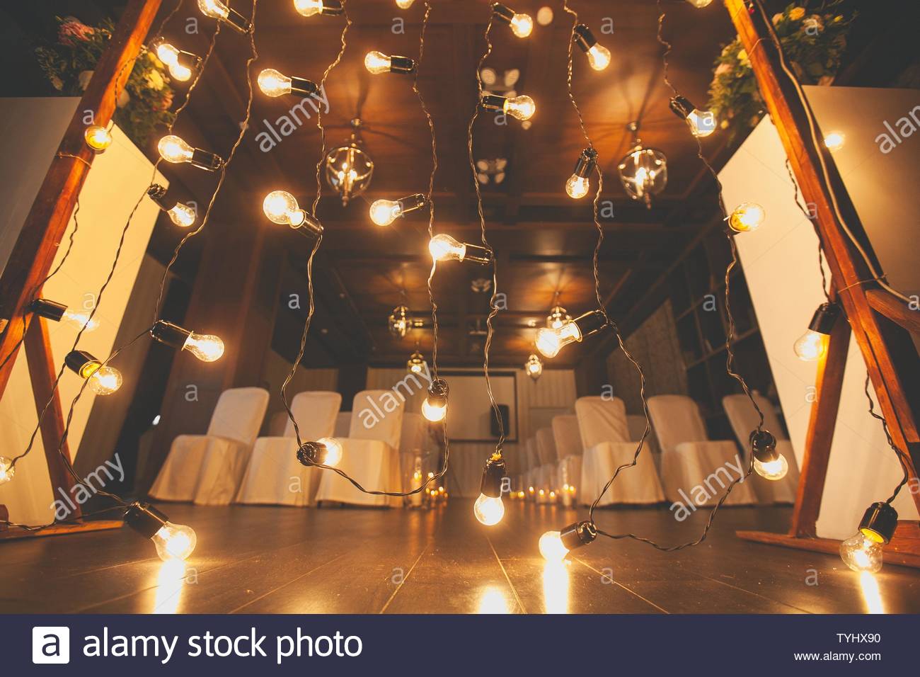 Burning Hanging Light Bulbs Close Up A Garland Of Lanterns