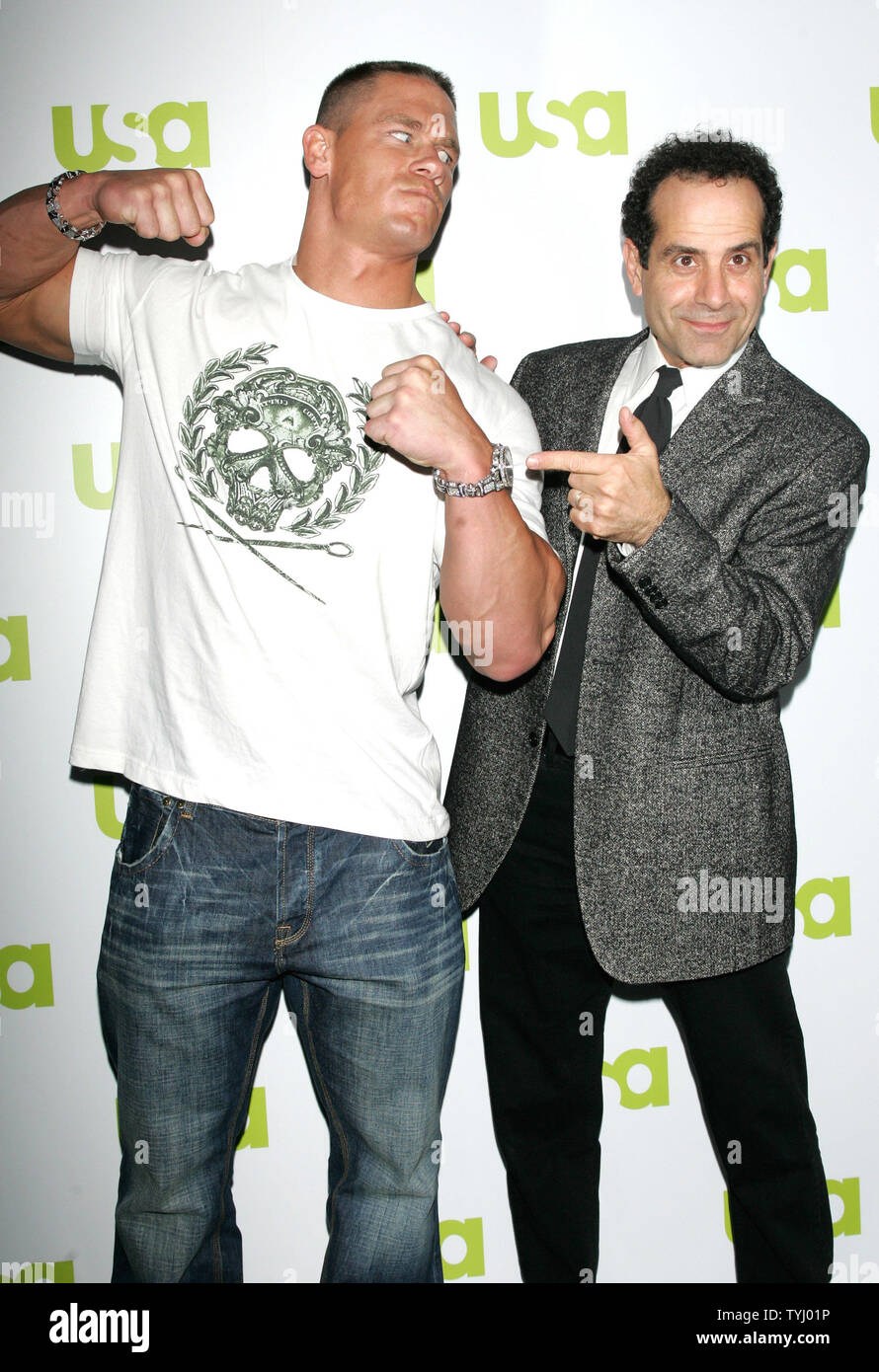 John Cena , left, of 'WWE Monday Night Raw,' and Tony Shalhoub, who stars in the show 'Monk,' attend the USA Network '2007 Upfront' event for new and returning programs which will be part of the cable television's upcoming lineup on March 28, 2007 in New York City.  (UPI Photo/Monika Graff) Stock Photo