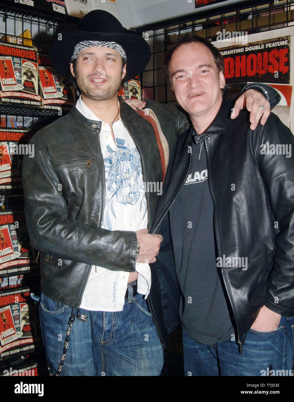 Director Robert Rodriguez (L) and actor-director Quentin Tarantino pose at Hanley's Universe book store while signing copies of their book based on their new film 'GrindHouse' on March 31, 2007 in New York.  (UPI Photo/Ezio Petersen) Stock Photo