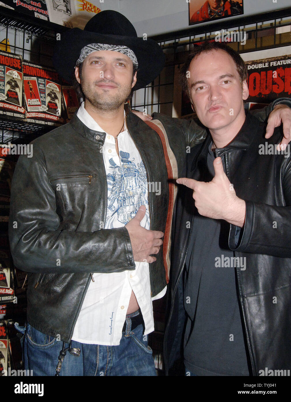 Director Robert Rodriguez (L) and actor-director Quentin Tarantino pose at Hanley's Universe  book store while signing copies of their book based on their new film 'GrindHouse' on March 31, 2007 in New York.  (UPI Photo/Ezio Petersen) Stock Photo