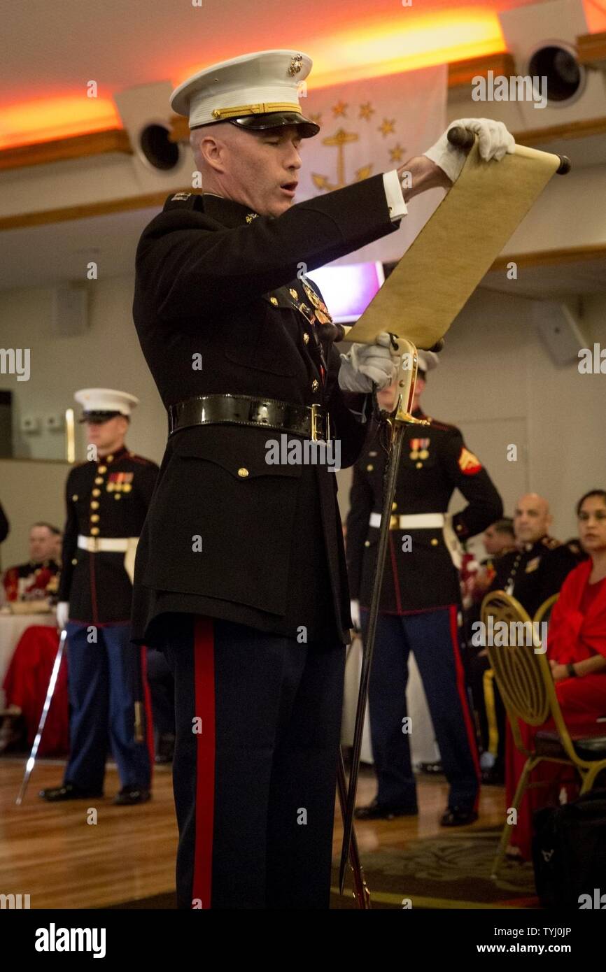 Capt. James Sherwood, 31st Marine Expeditionary Unit adjutant, reads Maj. Gen. John A. Lejeune's