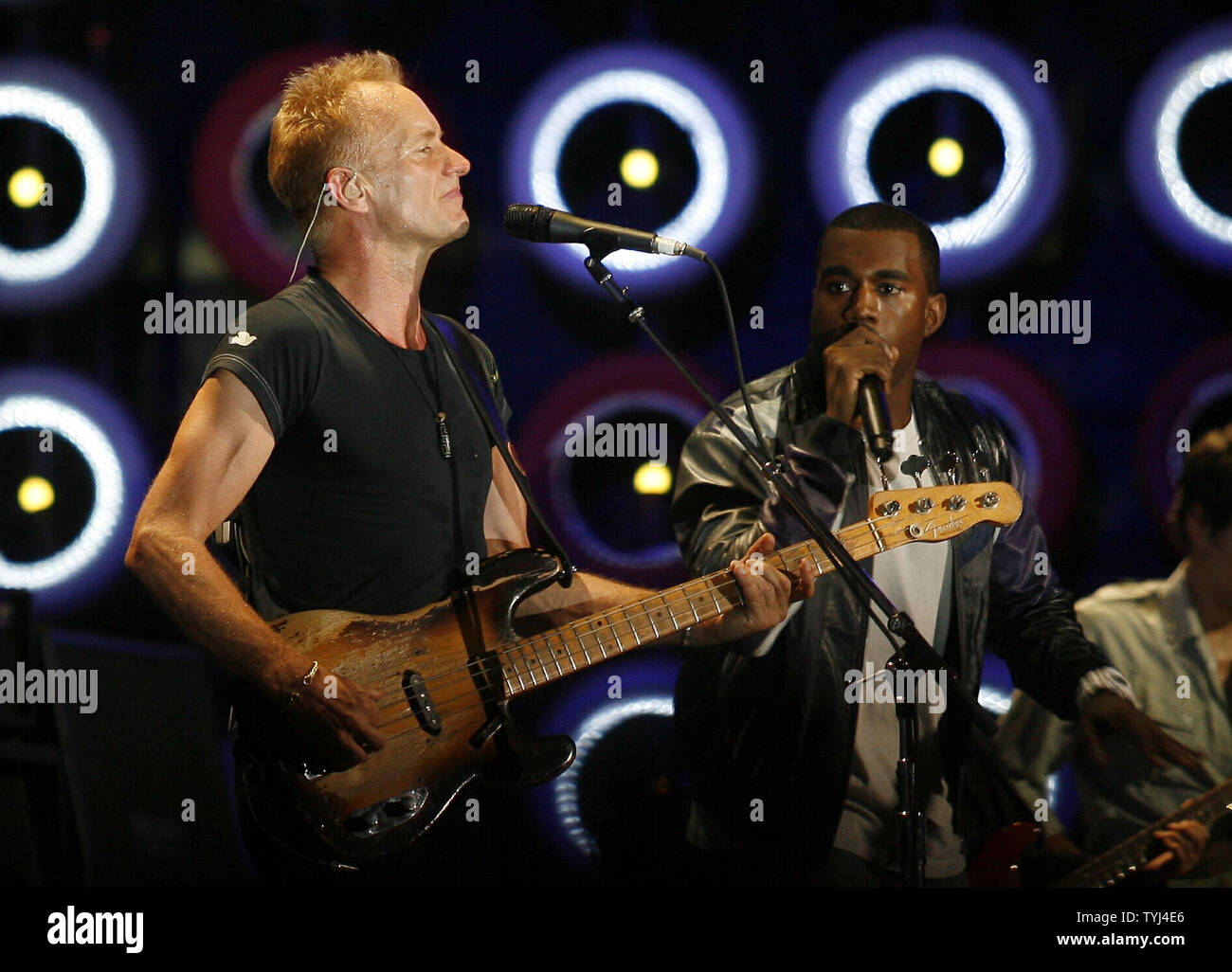 L-R) Sting and Kanye West perform with The Police during Live Earth, the  concerts for a climate in crisis, at Giants Stadium in East Rutherford, New  Jersey on July 7, 2007. (UPI