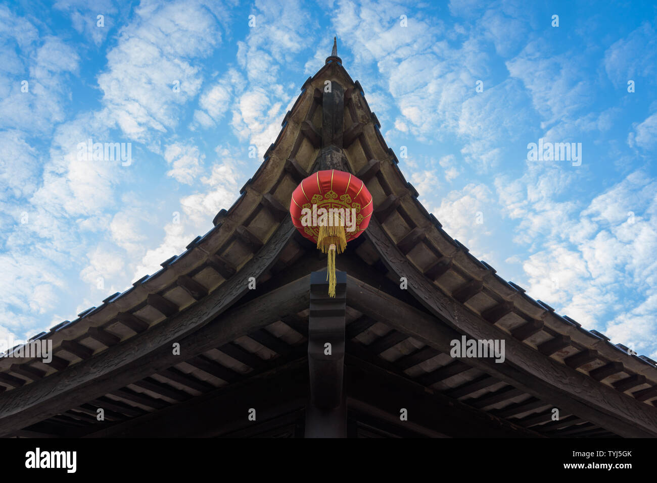 Red lanterns under the eaves Stock Photo - Alamy