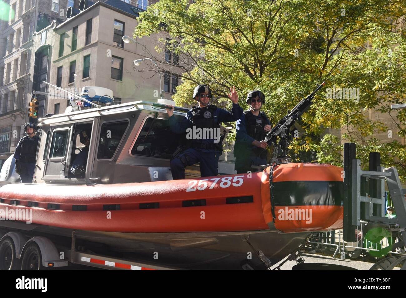 Coast Guard Maritime Safety and Security Team New York crewmembers wave ...