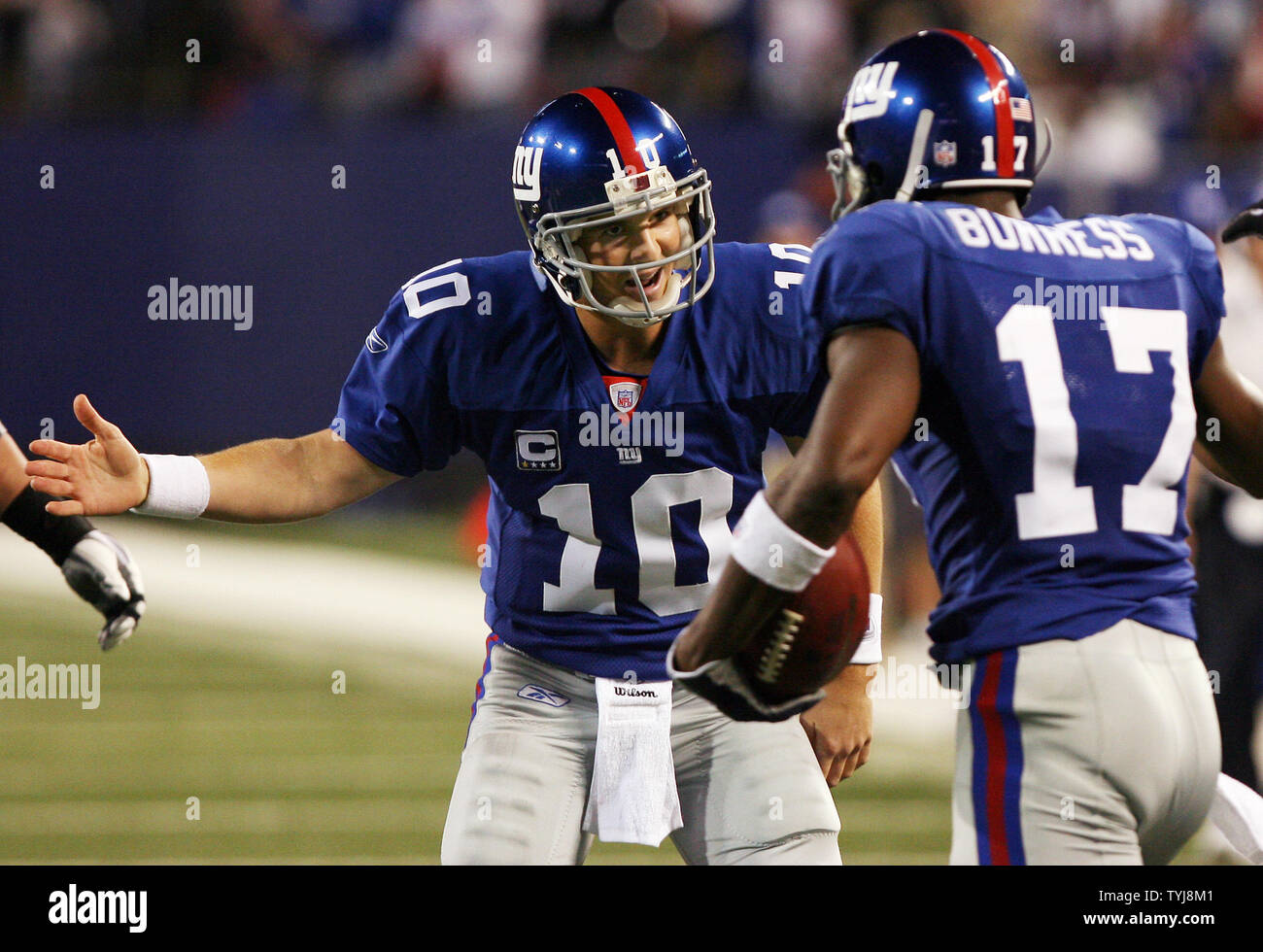 New York Giants Eli Manning celebrates after Plaxico Burress