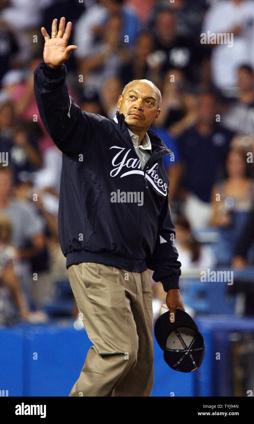 New York Yankees old timer Reggie Jackson waves to the fans before