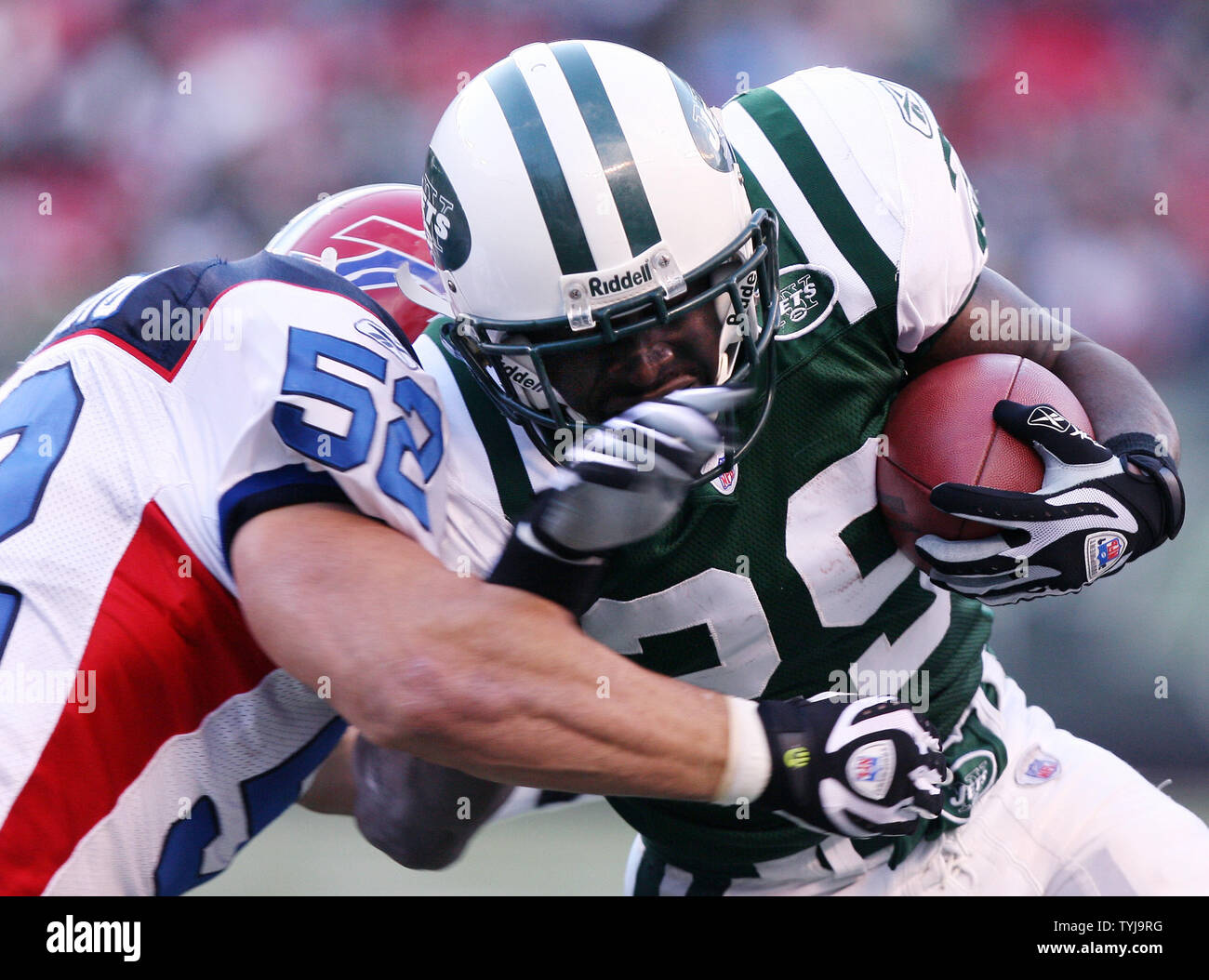 New York Jets Leon Washington gets hit by Buffalo Bills (52) John