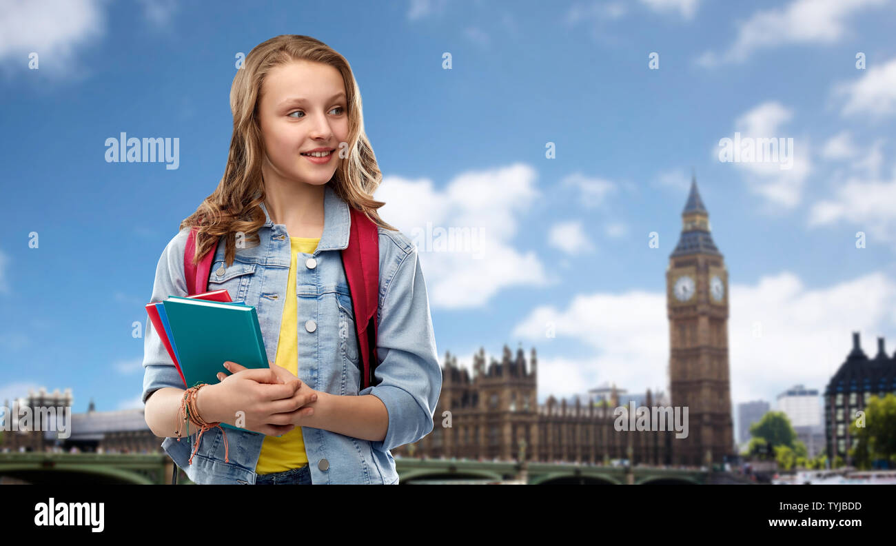 happy smiling teenage student girl with school bag Stock Photo - Alamy