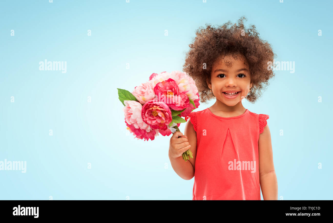happy little african american girl with flowers Stock Photo - Alamy