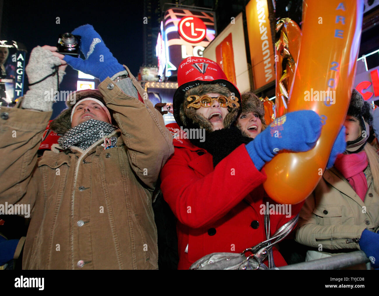 People celebrate the new year in Times Square where hundreds of thousands gathered for New Year's Eve on January 1, 2008 in New York. (UPI Photo/Monika Graff). Stock Photo