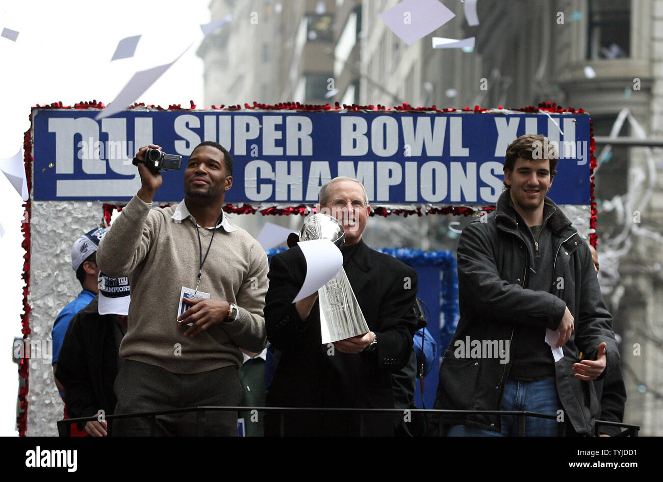 New York Giants Michael Strahan holds up the Vince Lombardi Trophy during  the Giants Super Bowl victory parade in New York City on February 5, 2008.  (UPI Photo/John Angelillo Stock Photo - Alamy