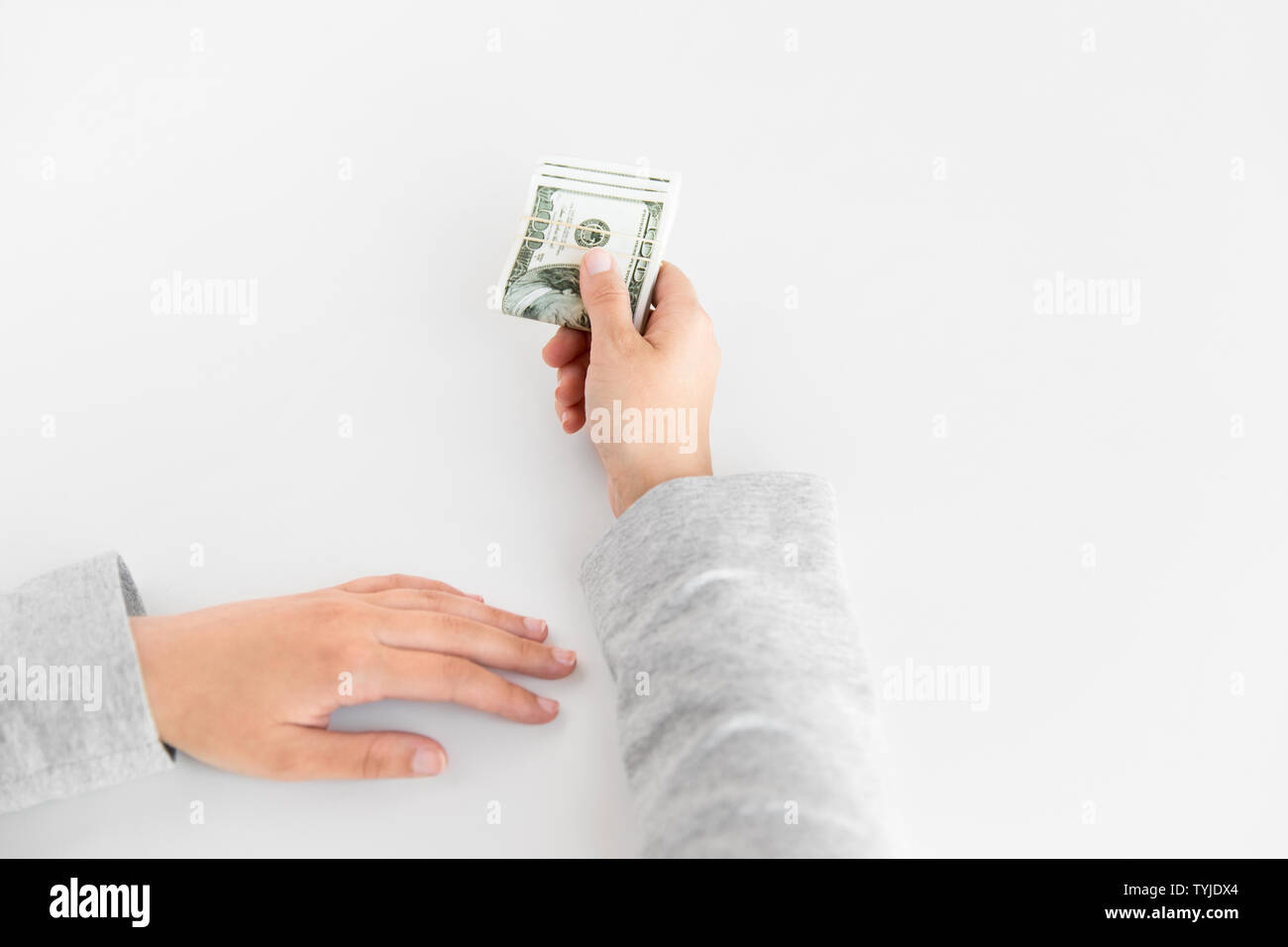 close up of woman hand holding us dollar money Stock Photo