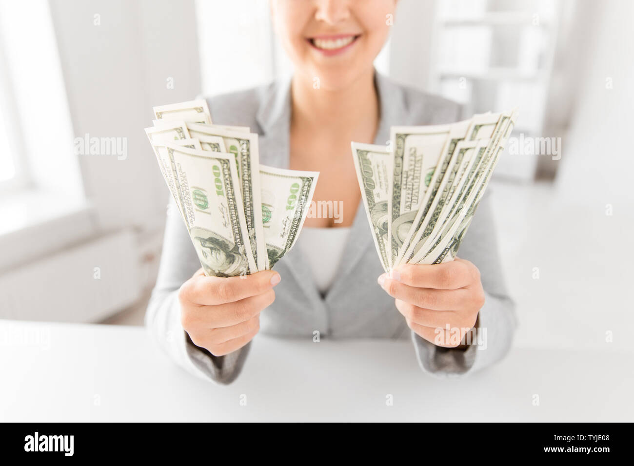 close up of woman hands holding us dollar money Stock Photo