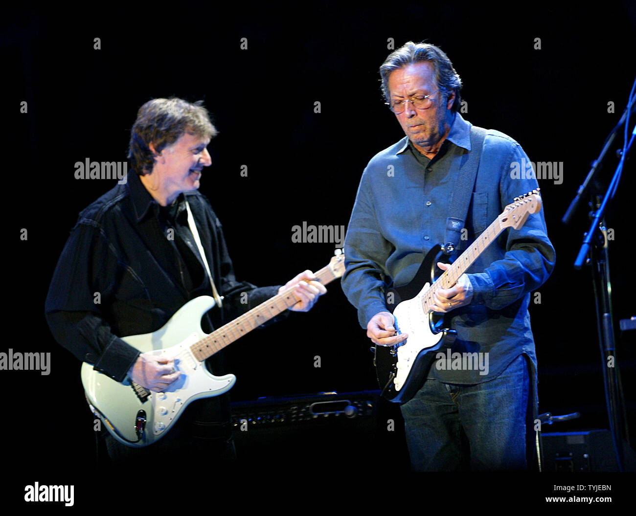 Steve Winwood (L) and Eric Clapton perform in concert at Madison 