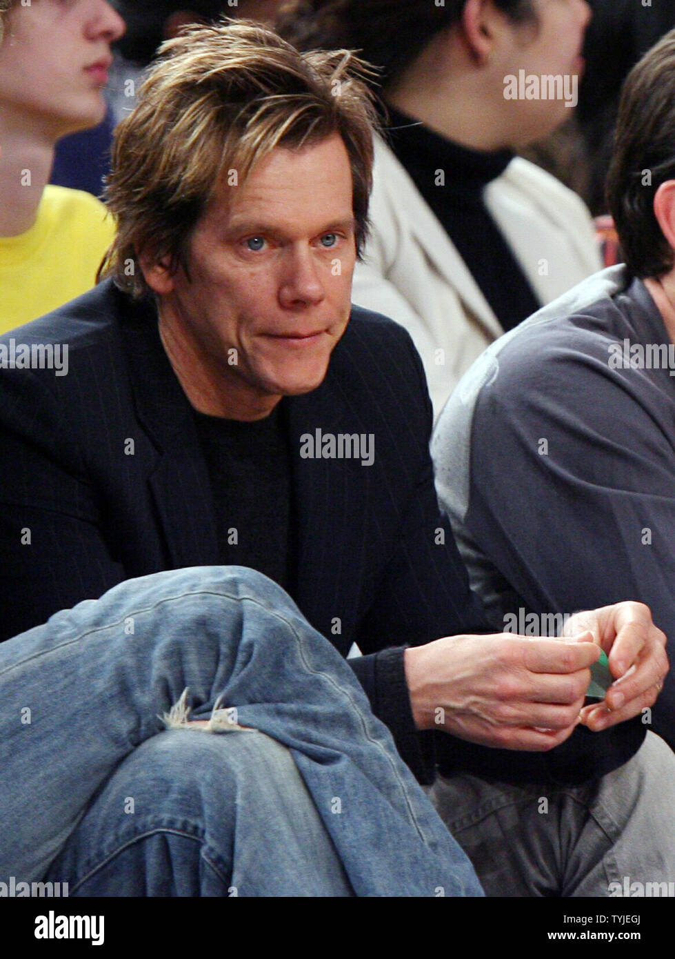 Kevin Bacon watches the New York Knicks play the Charlotte Bobcats at Madison Square Garden in New York City on February 27, 2008. The Knicks defeated the Bobcats 103-89.    (UPI Photo/John Angelillo) Stock Photo