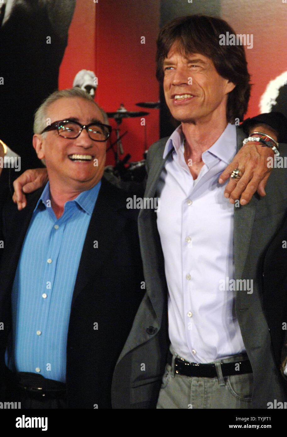 The Rolling Stones lead singer Mick Jagger and film director Martin Scorsese  (L) chat during the pre press conference photo op for the Martin Scorsese  film documentary on the Stones "Shine A