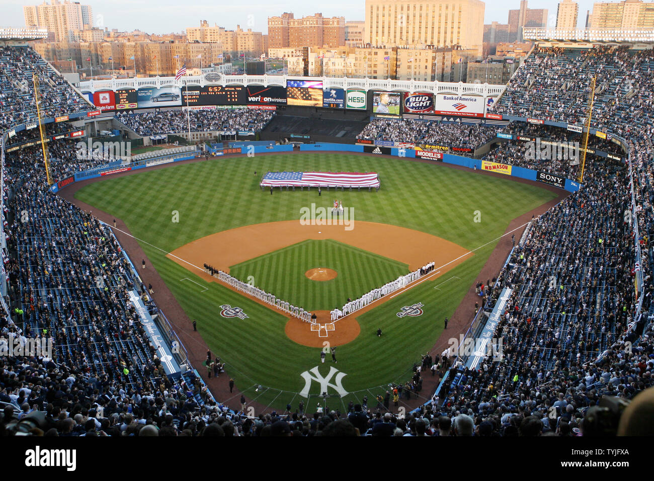 New York Yankees And Toronto Blue Jays Players Stand On The First And Third Base Lines During The National Anthem At Yankee Stadium In New York City On April 1 08 Upi