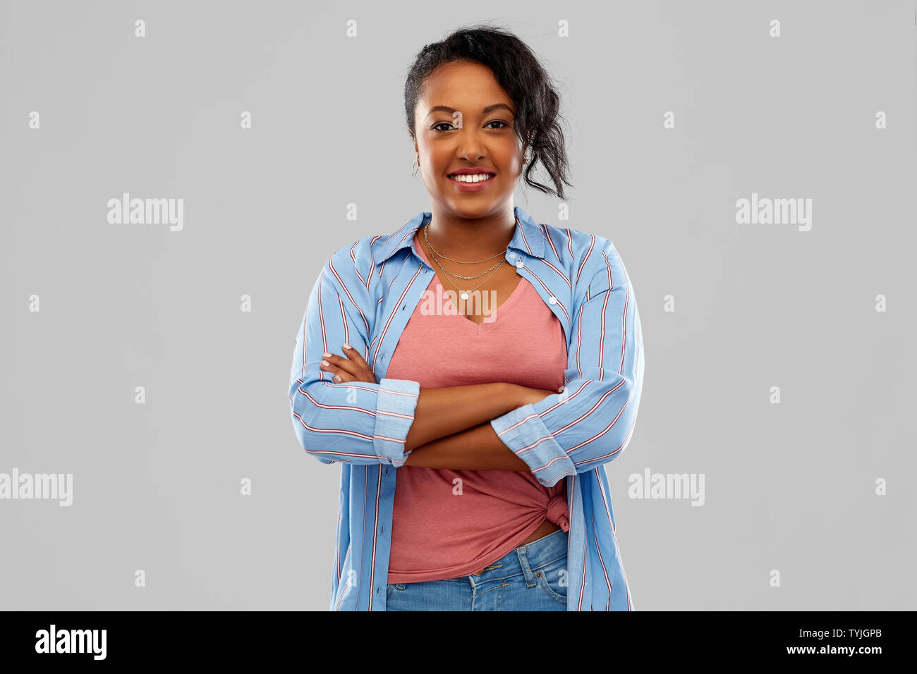 confident african american woman with crossed arms Stock Photo - Alamy