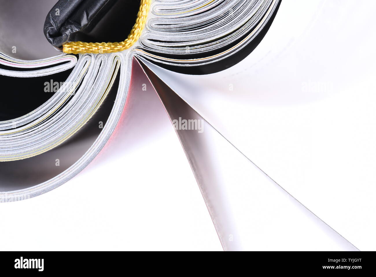 Macro view of book pages isolated on white background Stock Photo