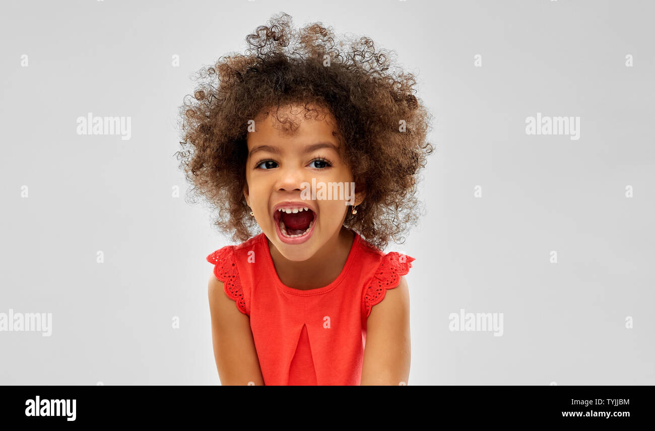 happy laughing little african american girl Stock Photo - Alamy