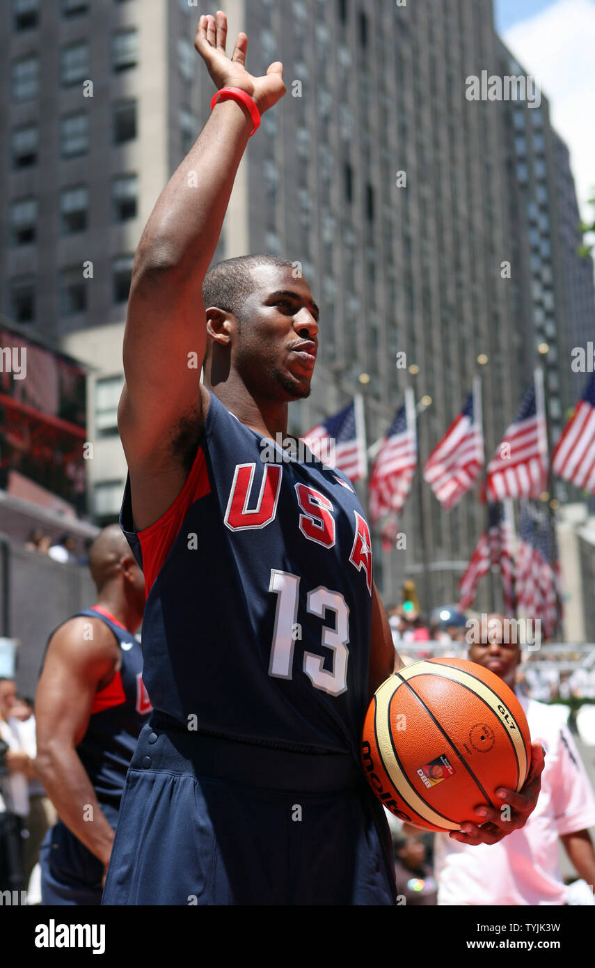 Chris Paul puts his hand in the air when the USA Olympic Basketball team is  introduced at Rockefeller Center in New York City on June 30, 2008. (UPI  Photo/John Angelillo Stock Photo -