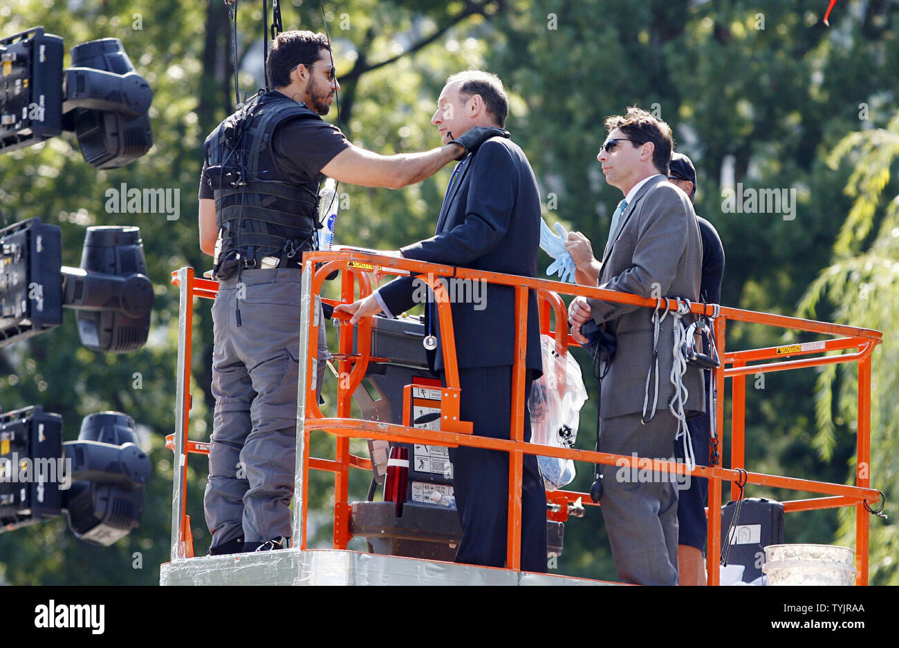 David Blaine (L) takes a break from performing his "Dive of Death