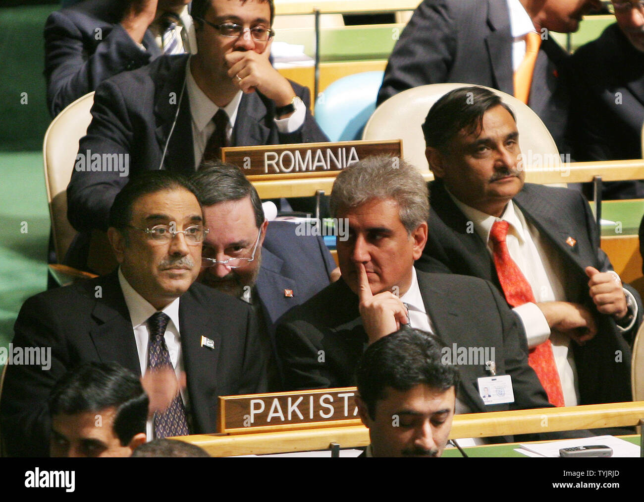 Asif Ali Zardari, left, President of Pakistan, listens to speakers before he addresses the 63rd session of the General Assembly at the United Nations on September 25, 2008 in New York City. (UPI Photo/Monika Graff) Stock Photo