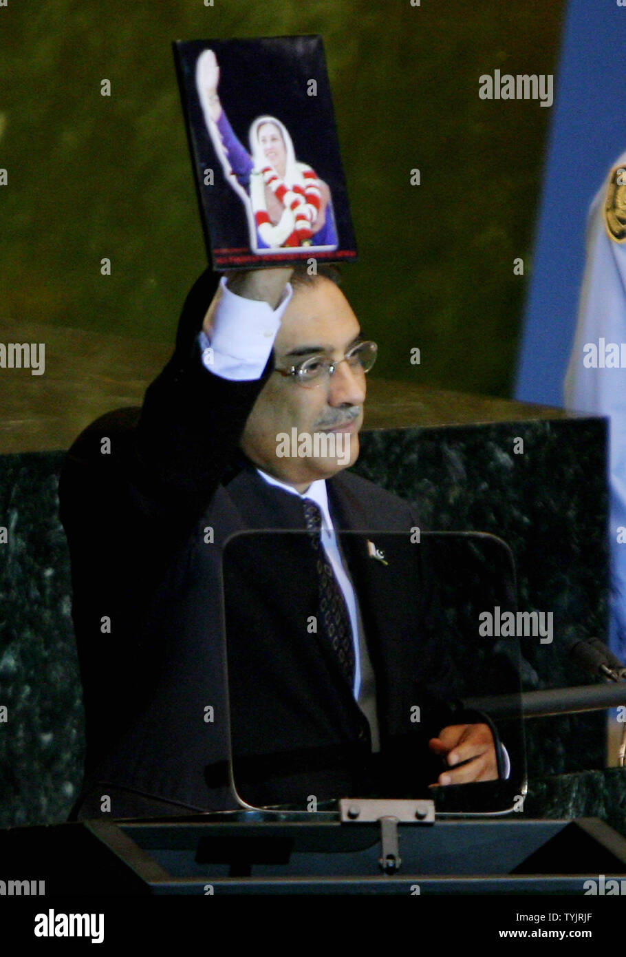 Asif Ali Zardari, President of Pakistan and husband of Benazir Bhutto, holds up a photo of the assassinated political leader as he addresses the 63rd session of the General Assembly at the UN on September 25, 2008 in New York City. (UPI Photo/Monika Graff) Stock Photo