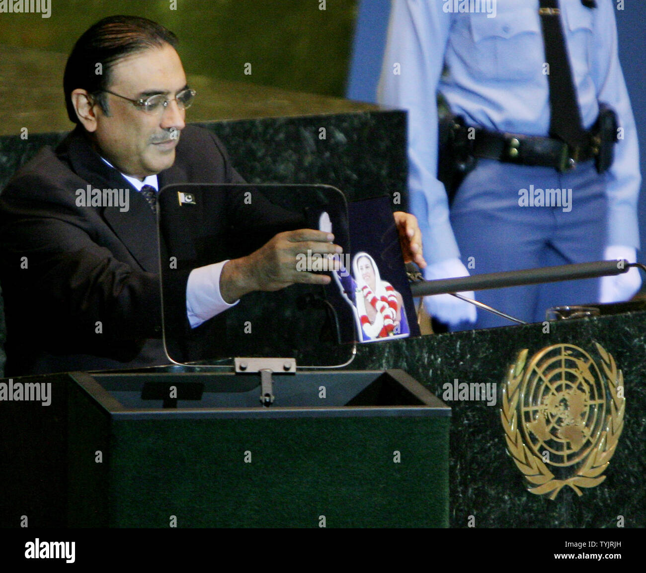 Asif Ali Zardari, President of Pakistan and husband of Benazir Bhutto, displays a photo of the assassinated political leader as he addresses the 63rd session of the General Assembly at the UN on September 25, 2008 in New York City. (UPI Photo/Monika Graff) Stock Photo
