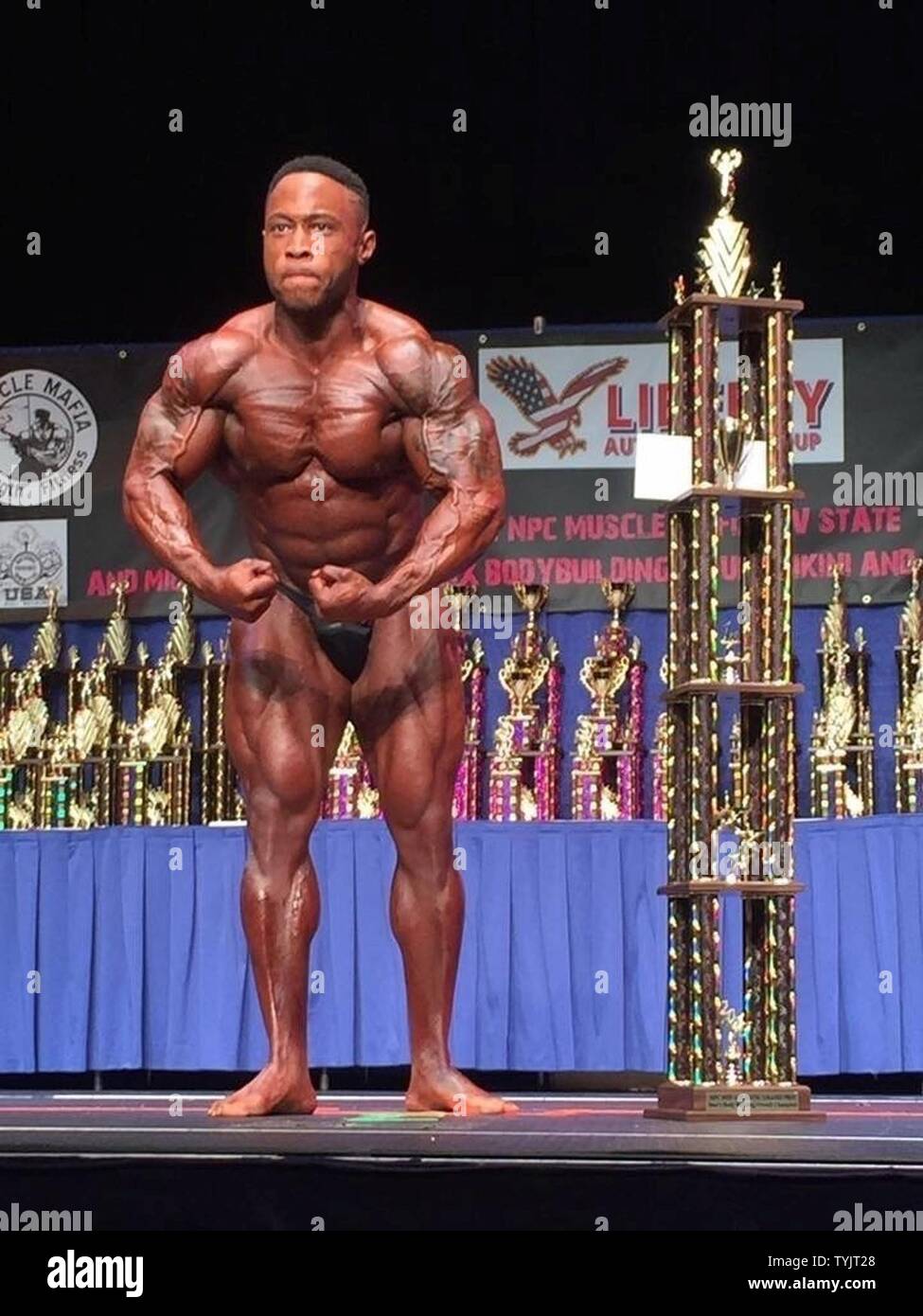 1st Lt. Stephen Bell with the 316thMission Support Element won the Light Heavyweight class division at the National Physique Committee Mid Atlantic Grand Prix, in Wheeling, W.Va., Nov. 11, 2016. The class win enabled Bell to compete in the overall event consisting of 220 competitors to take first place, beating Mr. West Virginia, the Heavyweight and Super Heavyweight champion. Stock Photo