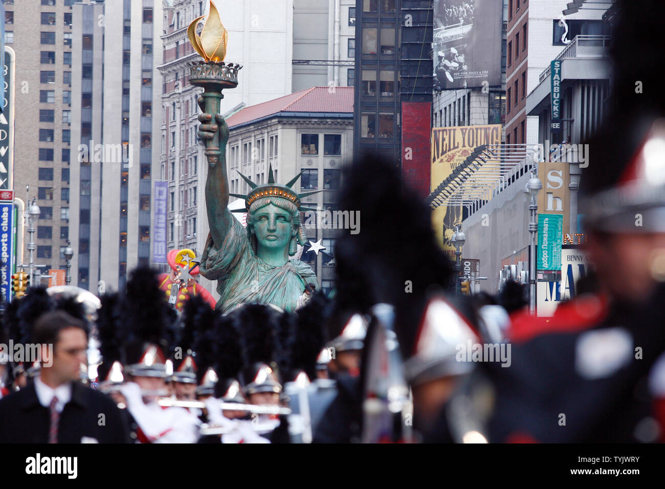 A Statue of Liberty float rides down the parade route at the Macy's