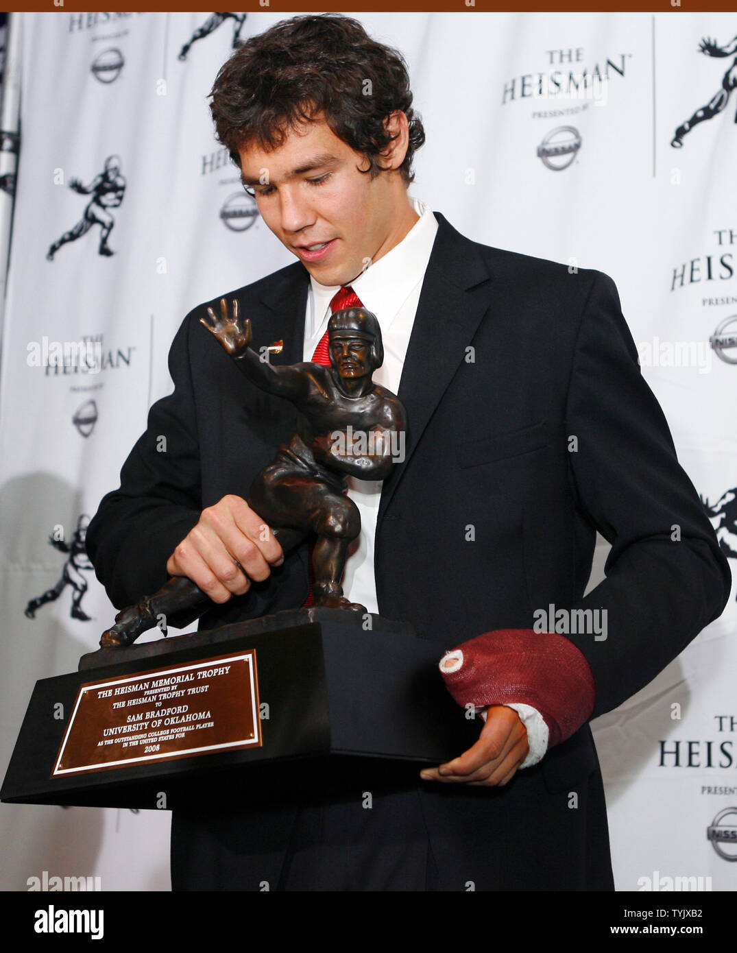 Sam Bradford of the University of Oklahoma holds the Heisman Trophy at the Sports Museum of America in New York City on December 13, 2008.                                        (UPI Photo/John Angelillo)   . Stock Photo