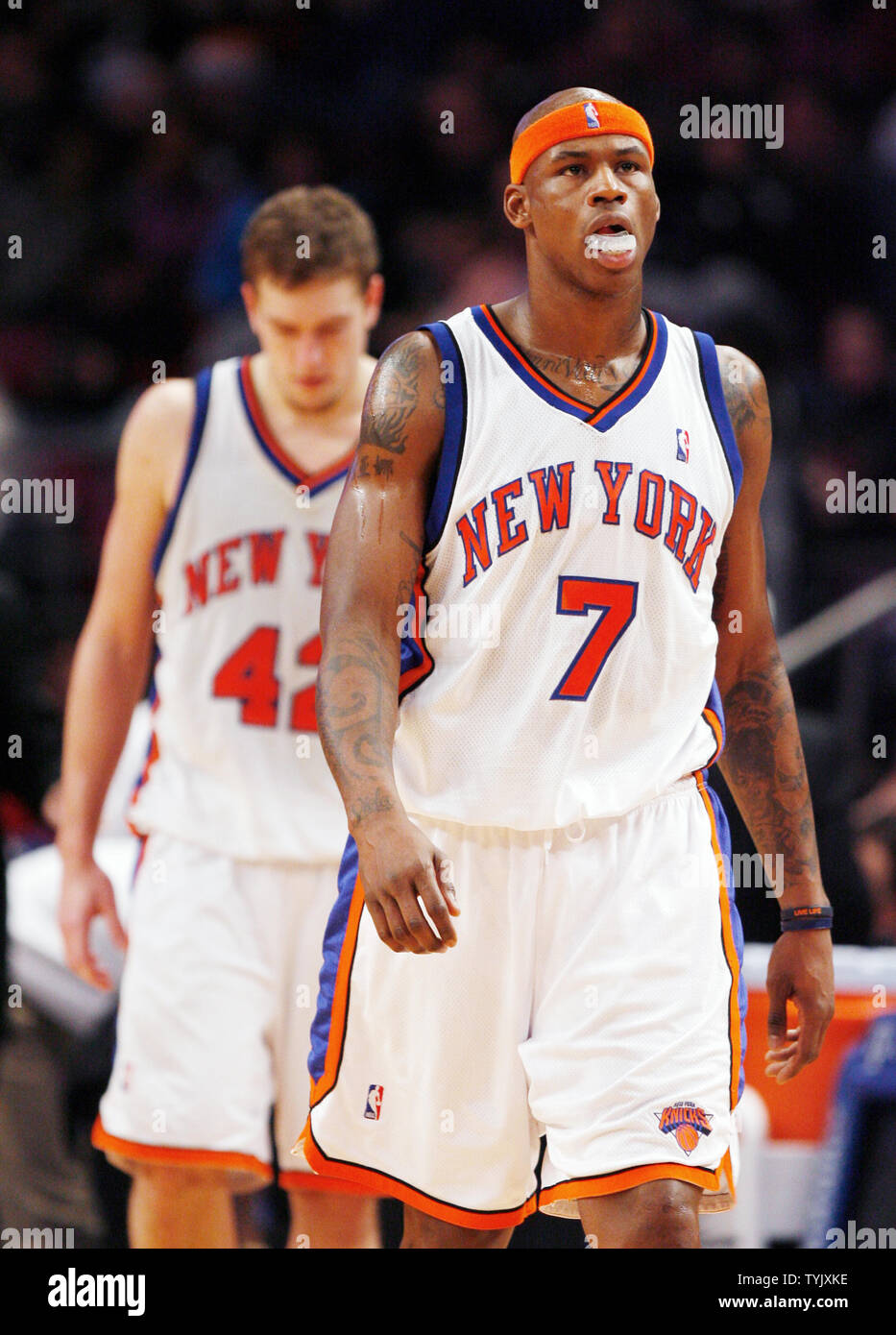New York Knicks David Lee and Al Harrington (7) walk on the court after a  time out in the fourth quarter against the Minnesota Timberwolves at  Madison Square Garden in New York