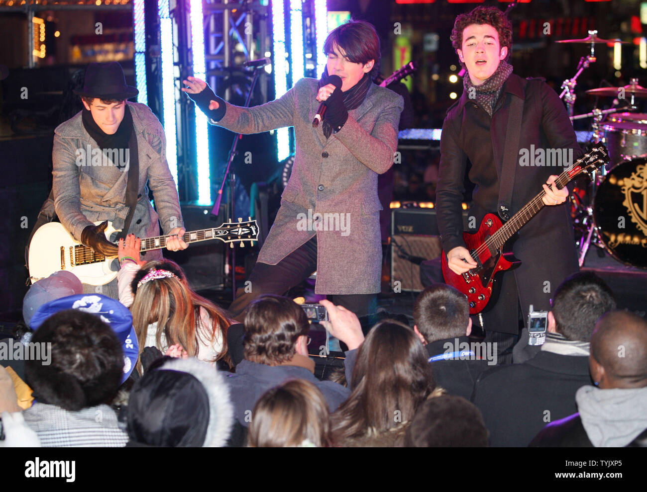 The Jonas Brothers perform in Times Square during the New Year's Eve celebration on December 31, 2008 in New York City. (UPI Photo/Monika Graff) Stock Photo