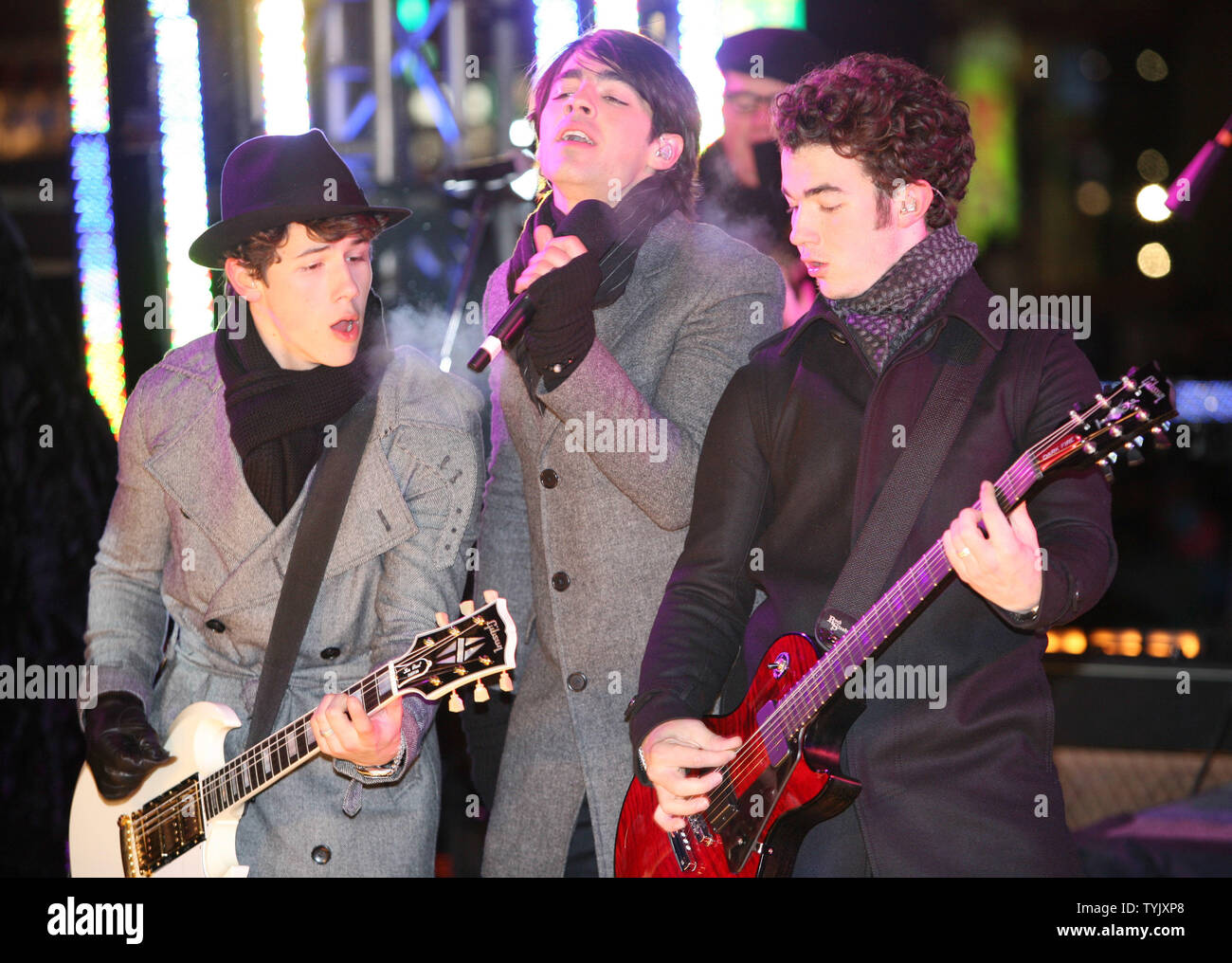 The Jonas Brothers perform in Times Square during the New Year's Eve celebration on December 31, 2008 in New York City. (UPI Photo/Monika Graff) Stock Photo